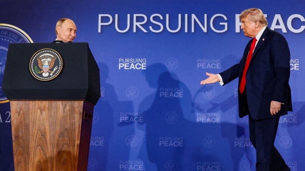 President Donald Trump walks towards Russian President Vladimir Putin during a press conference following their meeting to negotiate an end to the war in Ukraine, at Joint Base Elmendorf-Richardson, in Anchorage, Alaska, U.S., August 15, 2025. (Reuters File)