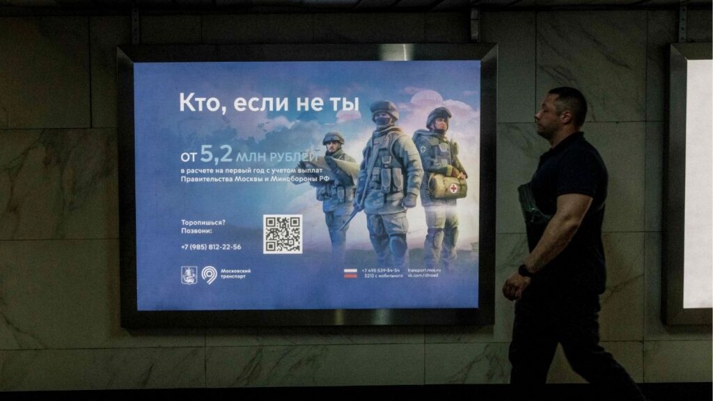 A military recruitment ad in Moscow, Nov. 11, 2026. For months, rumors of a possible forced mobilization — a second wave of the draft that began in September 2022 — has kept Russian men on edge. (Nanna Heitmann/The New York Times)
