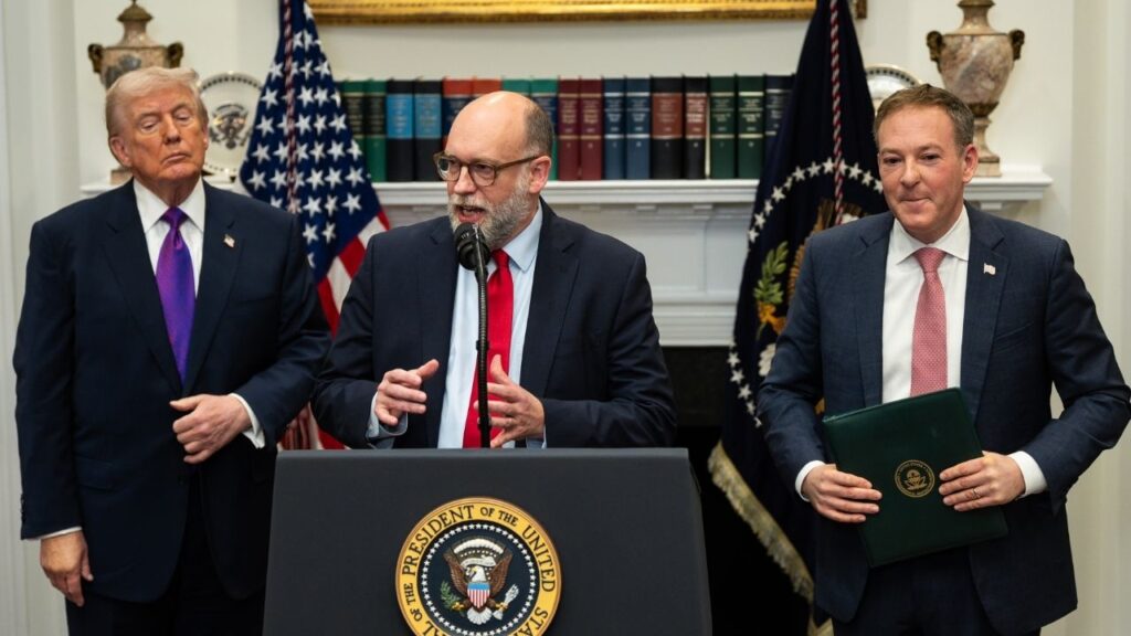 Russell Vought, center, the director of the Office of Management, speaks alongside Lee Zeldin, right, the EPA administrator, and President Donald Trump during an announcement on greenhouse gas regulation, in the Roosevelt Room of the White House in Washington, Feb. 12, 2026. The White House has begun drafting a new executive order that could further cement President Trump’s ability to control billions of dollars in scientific grants funded by the National Institutes of Health. (Tierney L. Cross/The New York Times)