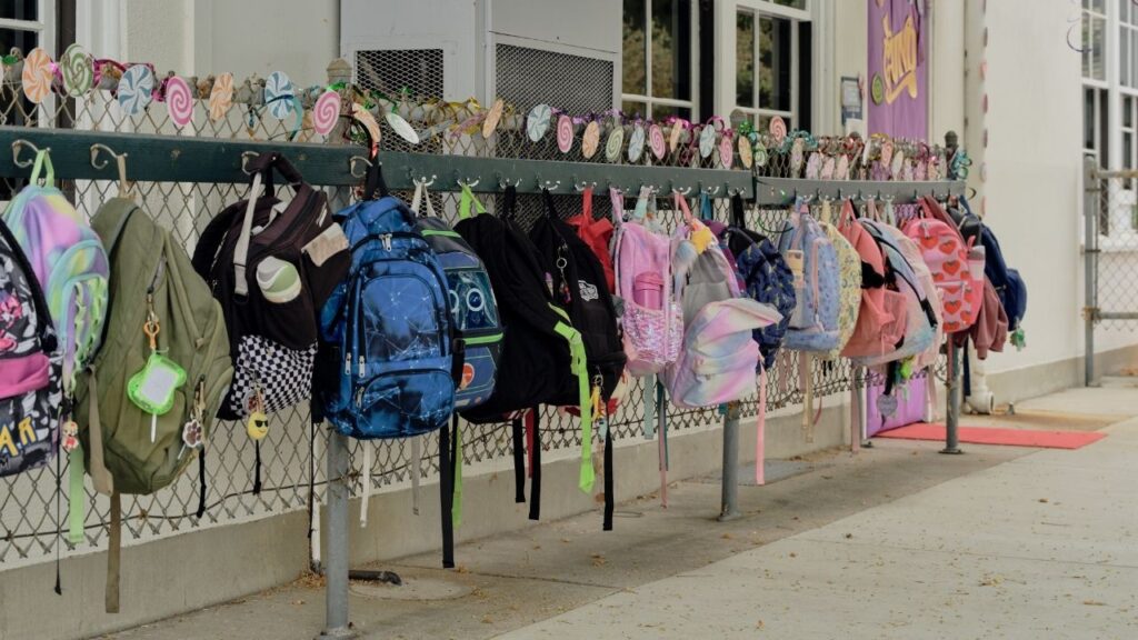 Student backpacks outside a classroom in Los Angeles, Sept. 25, 2024. The Los Angeles public school system will vastly restrict the use of artificial intelligence at all grade levels, district officials said on Wednesday at a board of education meeting. (Philip Cheung/The New York Times)