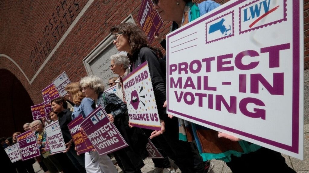 Supporters gather outside the federal courthouse after a hearing in a lawsuit brought by a coalition of Democratic state attorneys general seeking to block U.S. President Donald Trump's executive order tightening rules on mail-in voting, in Boston, Massachusetts, U.S., June 2, 2026. REUTERS/Brian Snyder