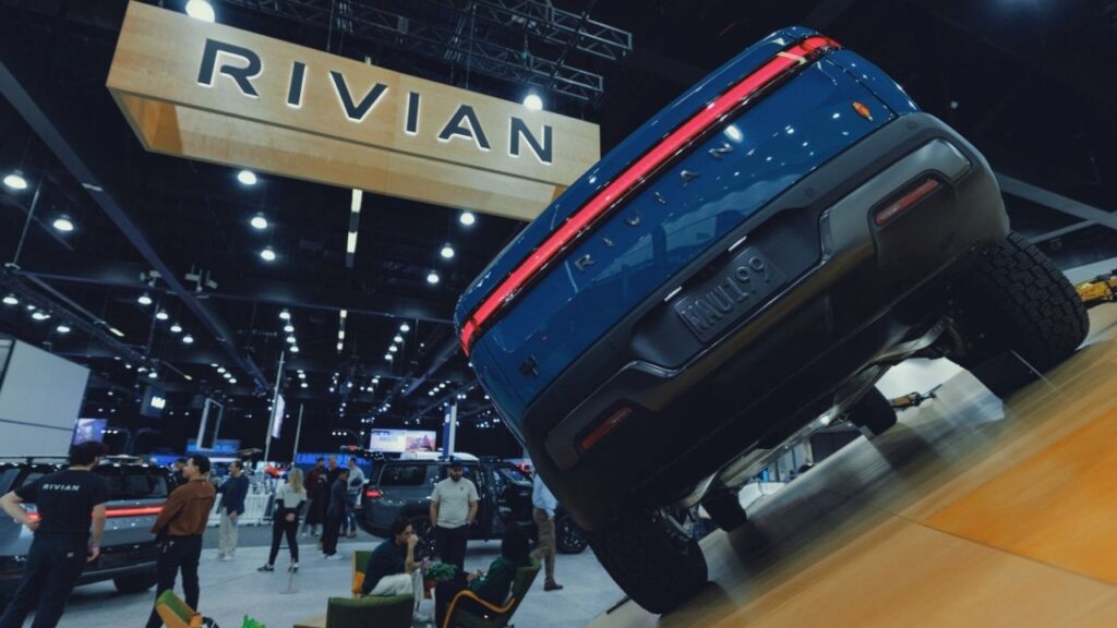 The logo of electric truck company Rivian is shown above a vehicle at the LA Auto show "AutoMobility LA" in Los Angeles, California, U.S. November 20, 2025. (Reuters File)