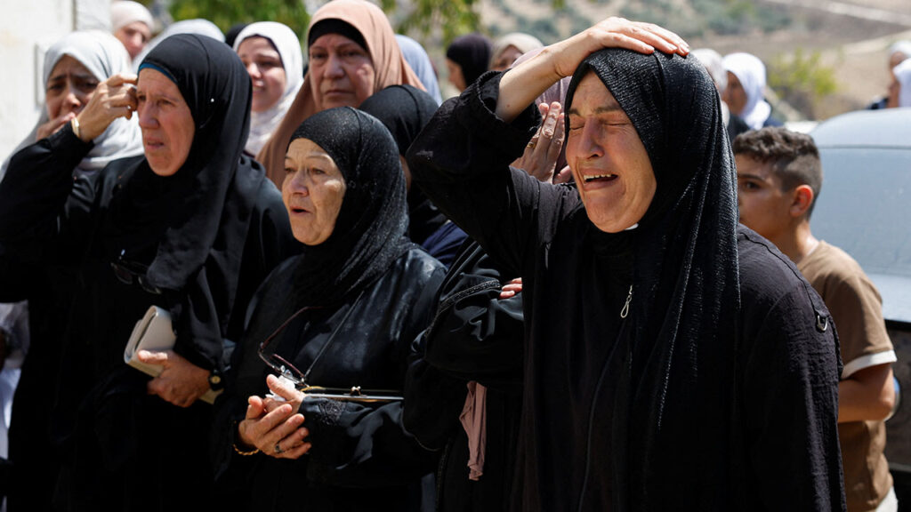 Mourners attend a funeral for a Palestinian killed during an Israeli settlers' attack, according to witnesses, in the village of Hajja near Qalqilya, in the Israeli-occupied West Bank, September 7, 2026. (Reuters/Mohammed Torokman)