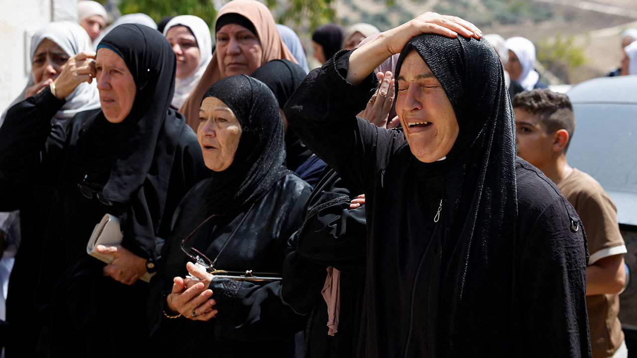 Mourners attend a funeral for a Palestinian killed during an Israeli settlers' attack, according to witnesses, in the village of Hajja near Qalqilya, in the Israeli-occupied West Bank, September 7, 2026. (Reuters/Mohammed Torokman)