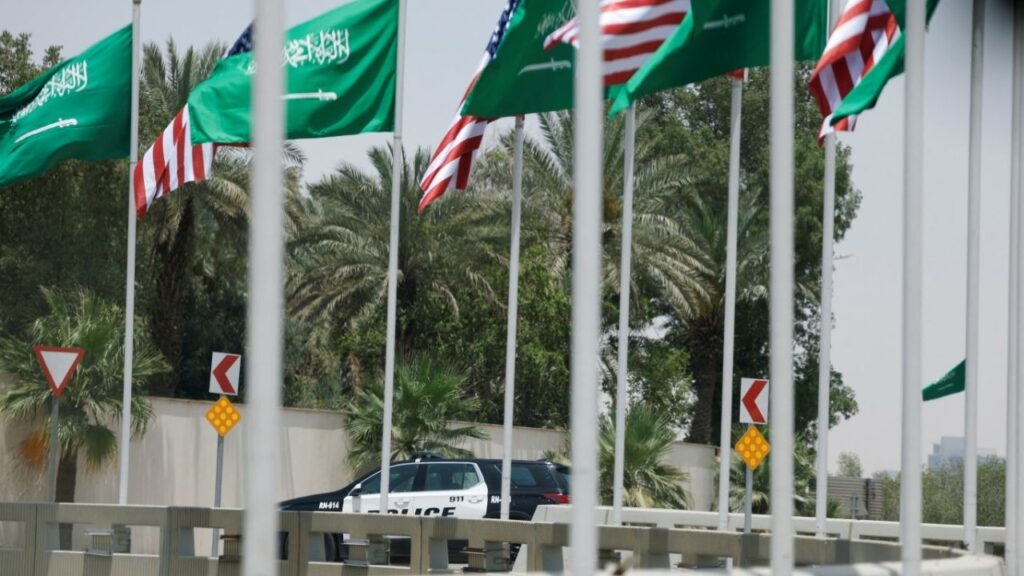 U.S. and Saudi flags flutter along a highway of Riyadh, as pictured through the glass of a car, ahead of the arrival of U.S. President Donald Trump to Riyadh, Saudi Arabia May 12, 2025. REUTERS/Hamad I Mohammed
