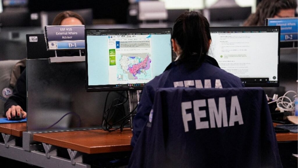 Federal Emergency Management Agency (FEMA) employees work ahead of a press conference at the FEMA National Response Coordination Center in Washington, D.C., U.S., January 24, 2026. Reuters/Nathan Howard