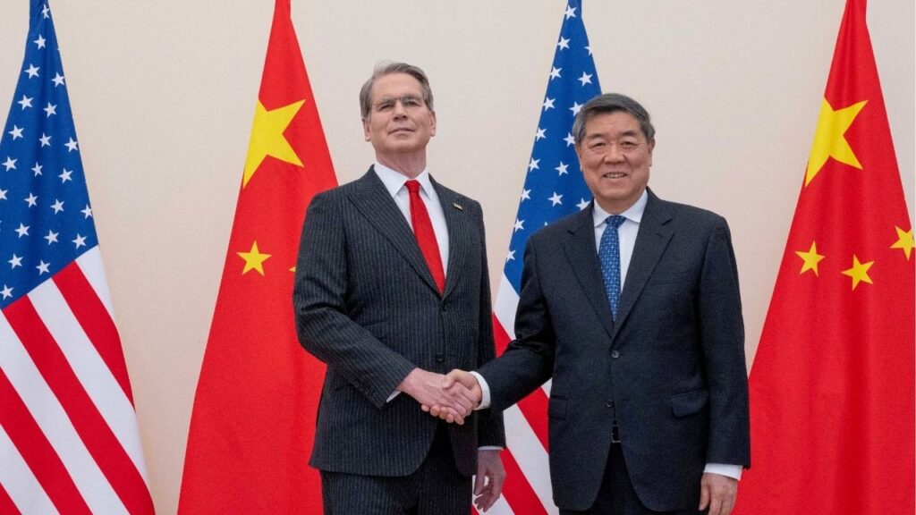 FILE PHOTO: U.S. Treasury Secretary Scott Bessent and Chinese Vice Premier He Lifeng shake hands during trade talks at OECD (Organisation for Economic Co-operation and Development) headquarters in Paris, France, March 16, 2026. The U.S. Treasury/Handout via Reuters/File Photo