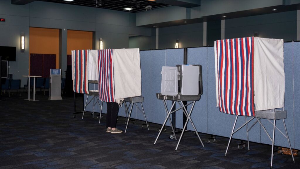 Voters at a polling place on primary election day in Anchorage, Aug. 18, 2206. An MIT. project plans to document what major A.I. systems say about an election as it unfolds. (Ash Adams/The New York Times)