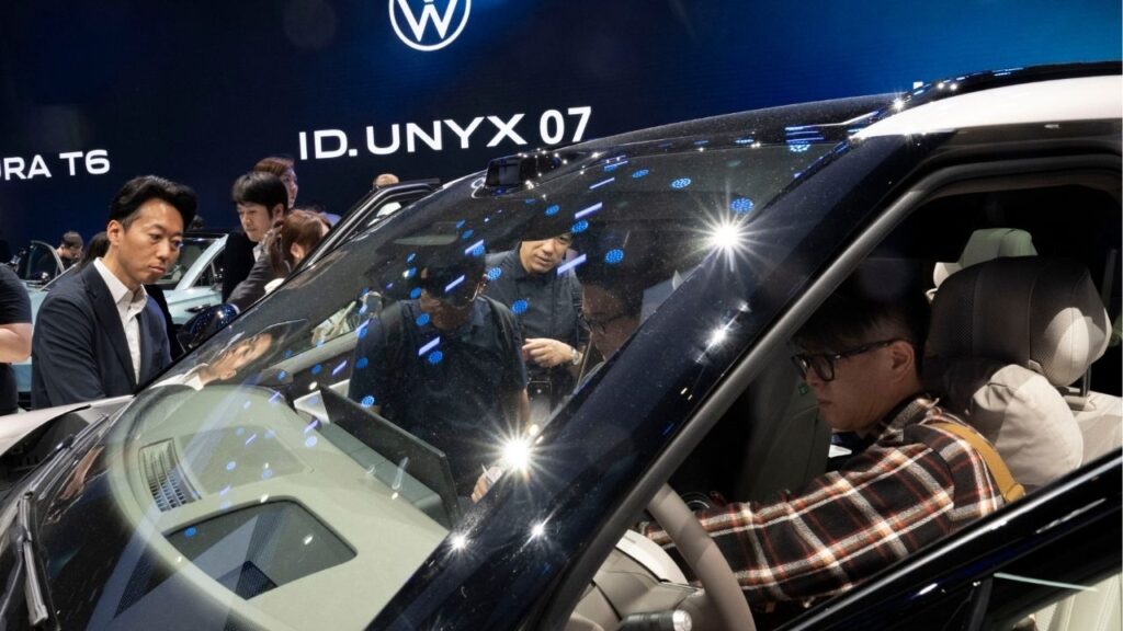 A Volkswagen at the Beijing Auto Show in the capital of China, April 24, 2026. The beleaguered auto giant reached a deal with unions to cut tens of thousands of jobs and slash production, but is it enough to revive the iconic German company? (Gilles Sabrié/The New York Times)