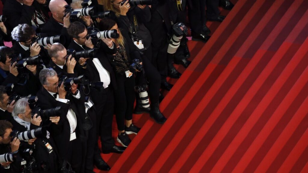 72nd Cannes Film Festival - Photographers are seen on the red carpet. REUTERS/Jean-Paul Pelissier