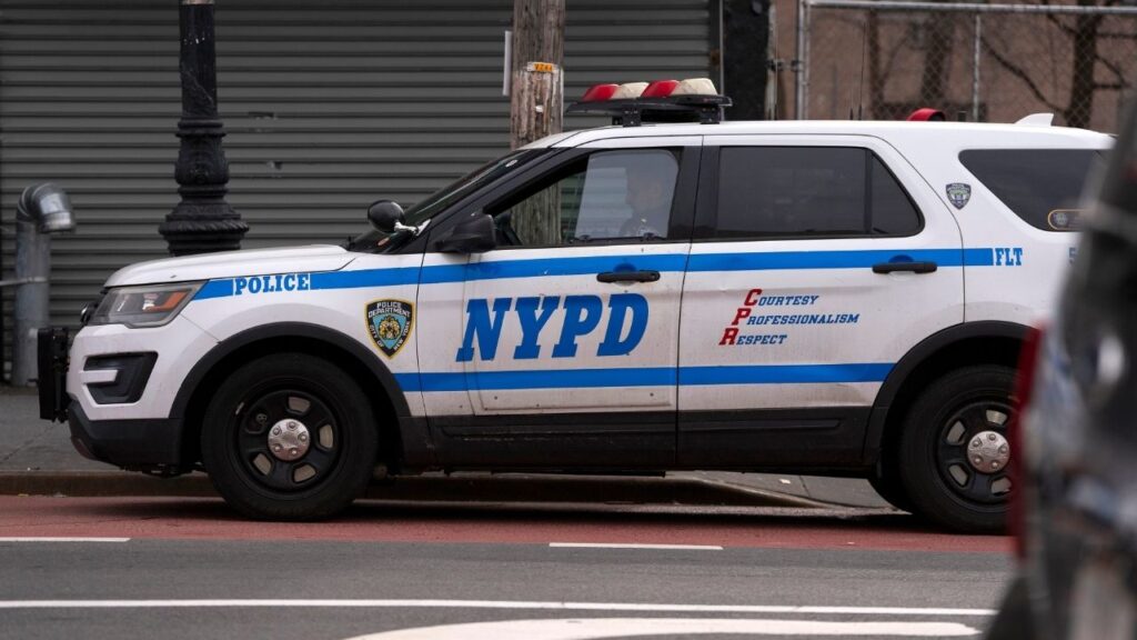 A New York City Police Department car in the Bronx on Feb. 20, 2025. Luis Rojas Cabrera, the head of a Bronx wellness center who does not have a New York medical license, was charged with second-degree murder on Tuesday, Oct. 6, 2026, in the death of Elizabeth Baron, who received a shot of a longevity supplement from Cabrera and died of an embolism. (Hiroko Masuike/The New York Times)
