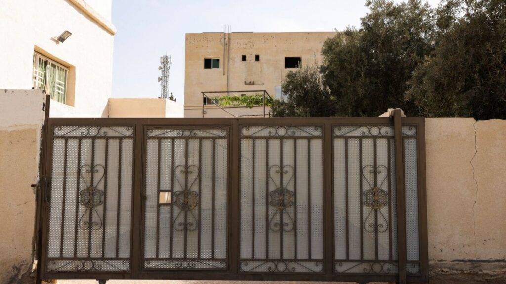 A building shows signs of gunfire at the site where Jordanian security forces arrested three suspects in connection with the deadly church shooting, in the Al-Judayyda area of Karak, Jordan, October 26, 2026. (Reuters/Alaa Al Sukhni)