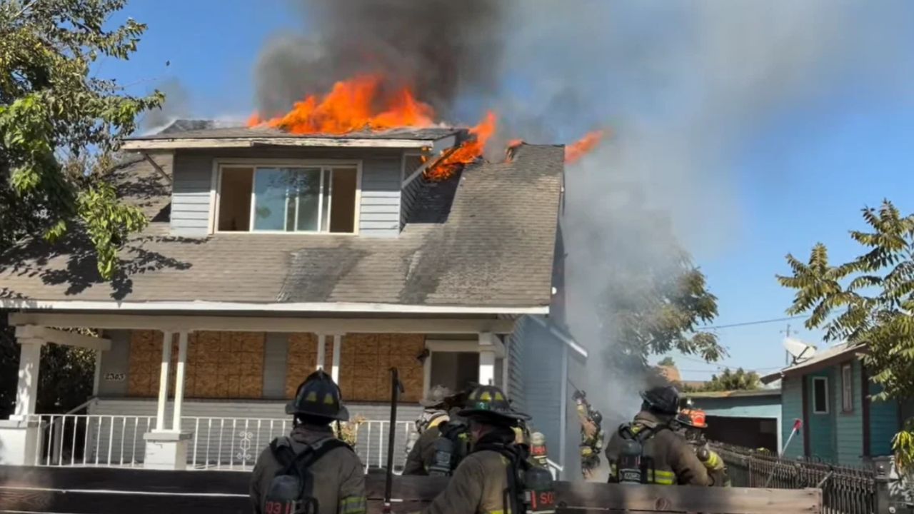 A fire that started in a trash can spread to a vacant Fresno home Monday, drawing 47 firefighters and causing extensive damage. (Fresno FD)