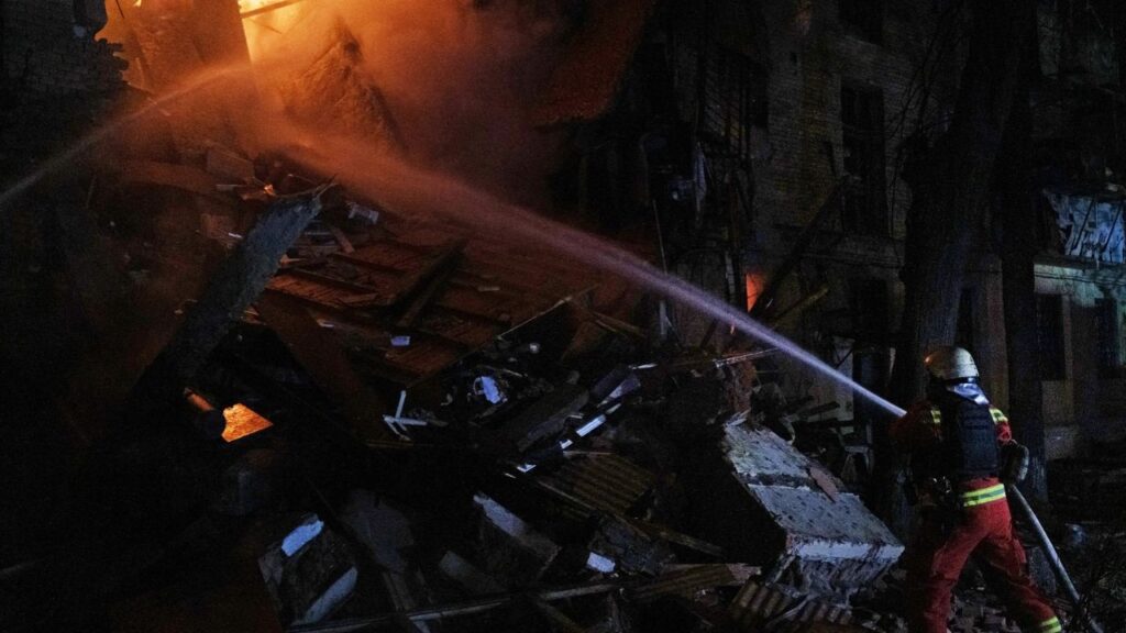 A firefighter at a compound hit by a strike in Kharkiv, northern Ukraine, Oct. 12, 2026. President Volodymyr Zelenskyy said on Tuesday that Kyiv had received no warning from its Western partners before a Russian ballistic missile attack. (Mauricio Lima/The New York Times)
