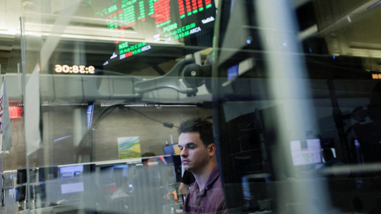 A futures-options trader works on the floor at the New York Stock Exchange (NYSE) in New York City, U.S., August 21, 2026. (Reuters File)