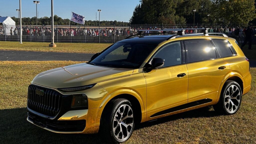 A gold Audi Q9 SUV is displayed outside the venue of US President Donald Trump's political rally before his arrival in Perry, Georgia, US, October 24, 2026. REUTERS/Bo Erickson