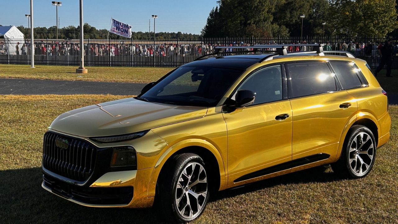 A gold Audi Q9 SUV is displayed outside the venue of US President Donald Trump's political rally before his arrival in Perry, Georgia, US, October 24, 2026. REUTERS/Bo Erickson