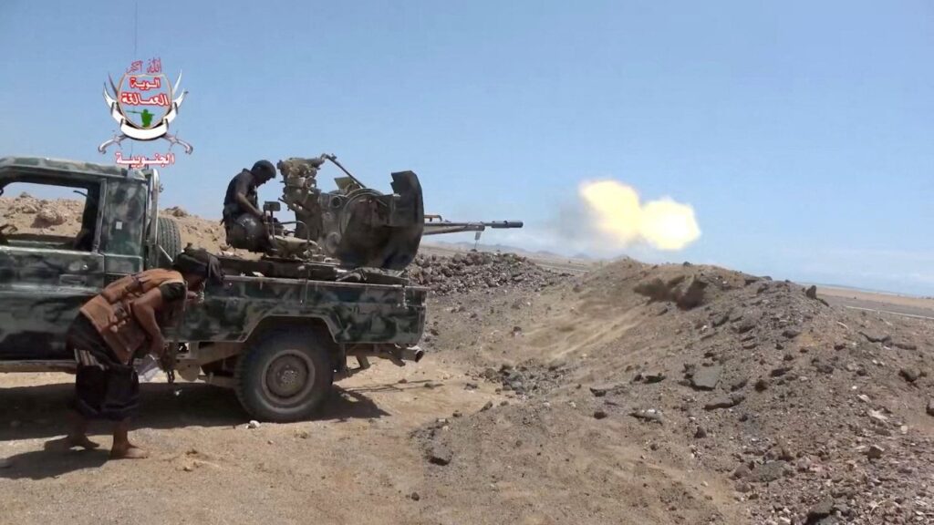 A pro-Saudi-backed Yemeni government fighter fires a vehicle-mounted weapon during what government forces say was an advance against the Iran-backed Houthis, near Dhubab, Taiz Governorate, Yemen, in this still image taken from video released October 5, 2026. (Reuters File)