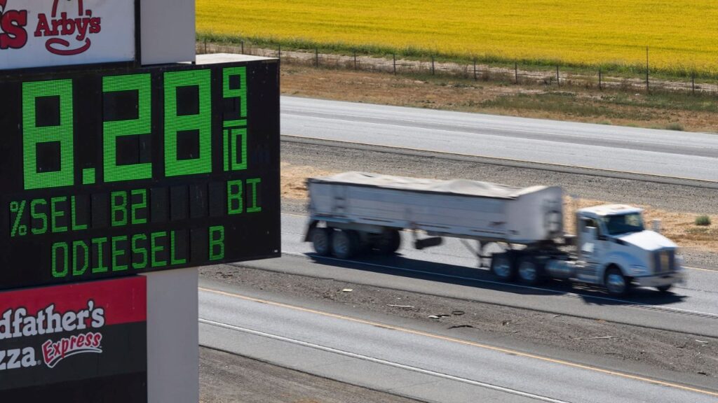 A semi drives past a sign advertising the price of diesel along Interstate 5 in Williams, California, U.S., September 28, 2026. (Reuters File)