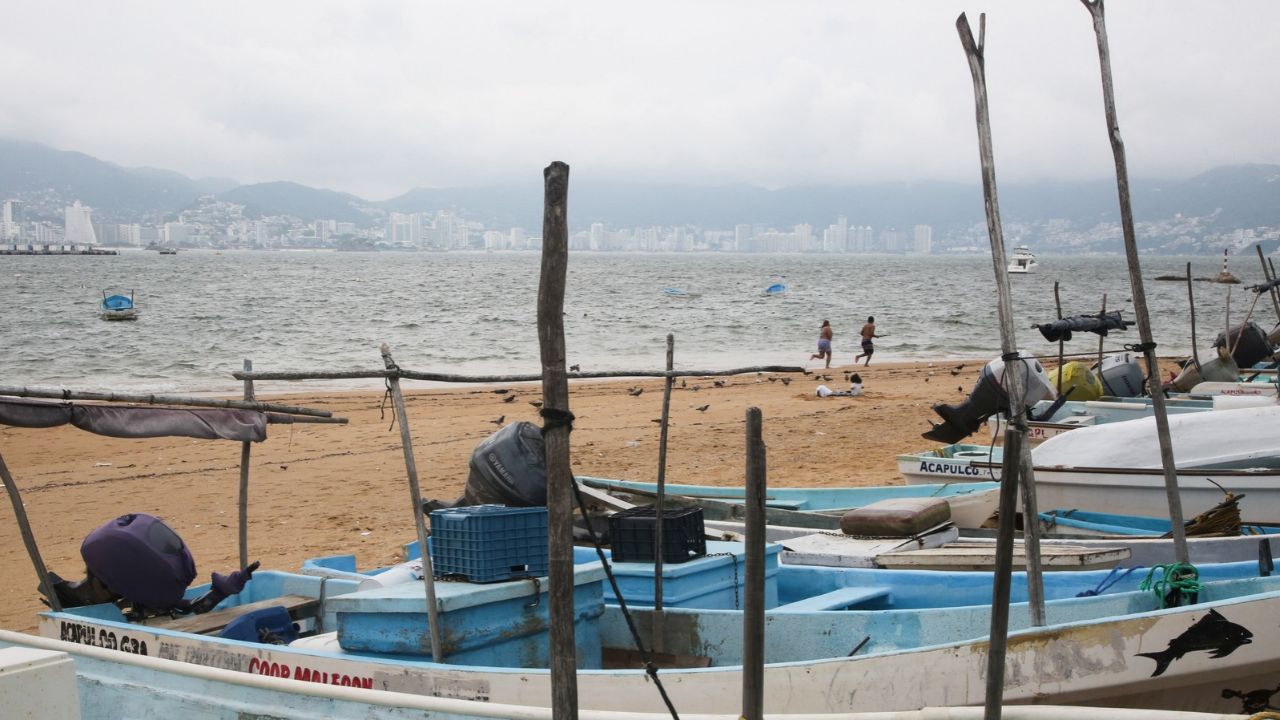 Fishing boats rest on the sand after being pulled from the sea as Hurricane Trudy moves parallel to Mexico's Pacific coast, threatening more rain and strong winds after recent deadly storms, in Acapulco, Mexico, October 15, 2026. REUTERS/Javier Verdin