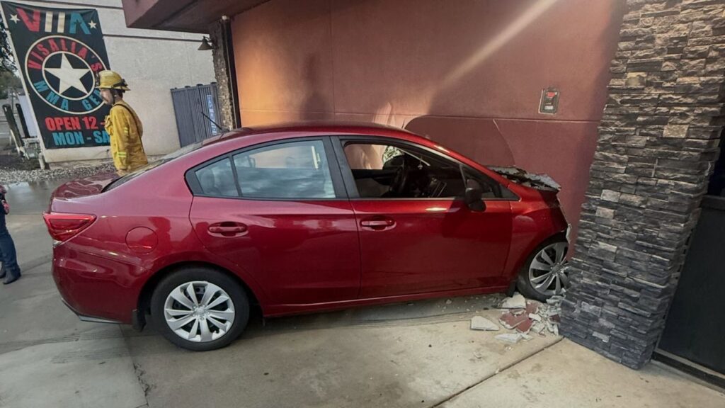 A vehicle crashed into a Visalia business Thursday evening after the driver's foot slipped from the brake pedal onto the accelerator, police said. (Visalia PD)
