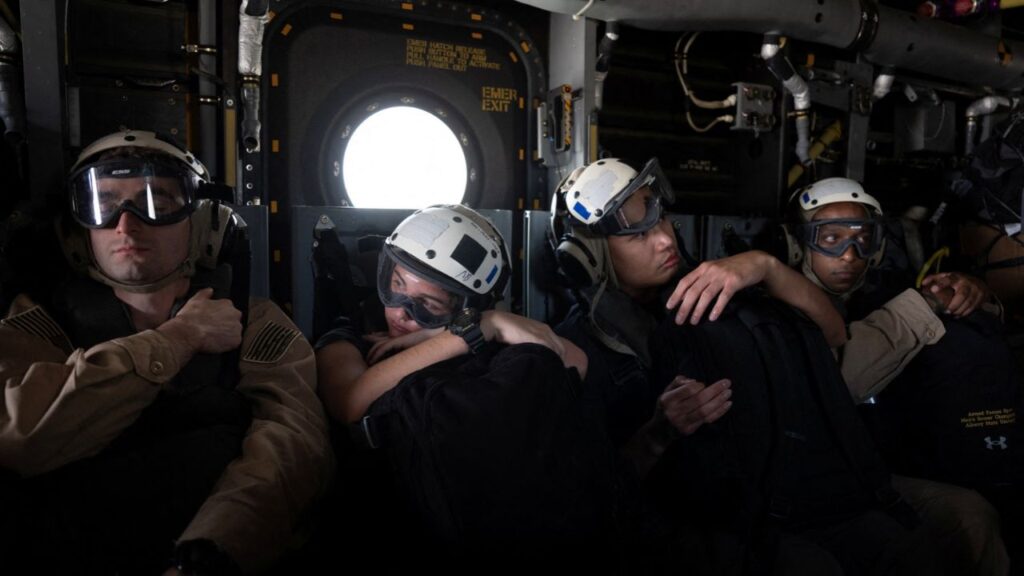 US Navy sailors aboard an MV-22 Osprey travel to the Nimitz-class aircraft carrier USS George Washington in the Arabian Sea, September 11, 2026. The aircraft carrier, capable of carrying more than 5,000 personnel, is enforcing a US naval blockade against Iran and providing cover for commercial vessels transiting the Strait of Hormuz. Reuters/Ed Ou