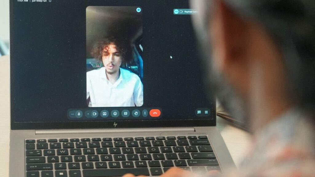 Adem El Adeb, a friend of the adolescent suspected of being behind the massive break-in at the FBI, speaks to Reuters from the United Arab Emirates in an online video interview conducted in Washington, DC, US, October 9, 2026. REUTERS/Stelios Varias