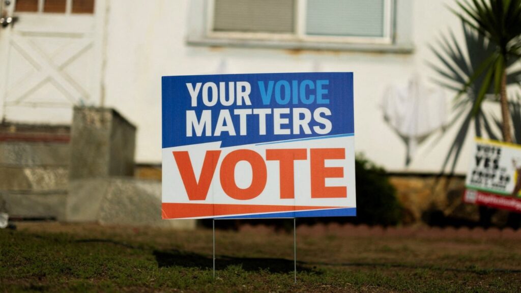 An election sign encouraging people to vote is displayed in the front yard of a residential home in Encinitas, California, US, October 21, 2026. (Reuters File)