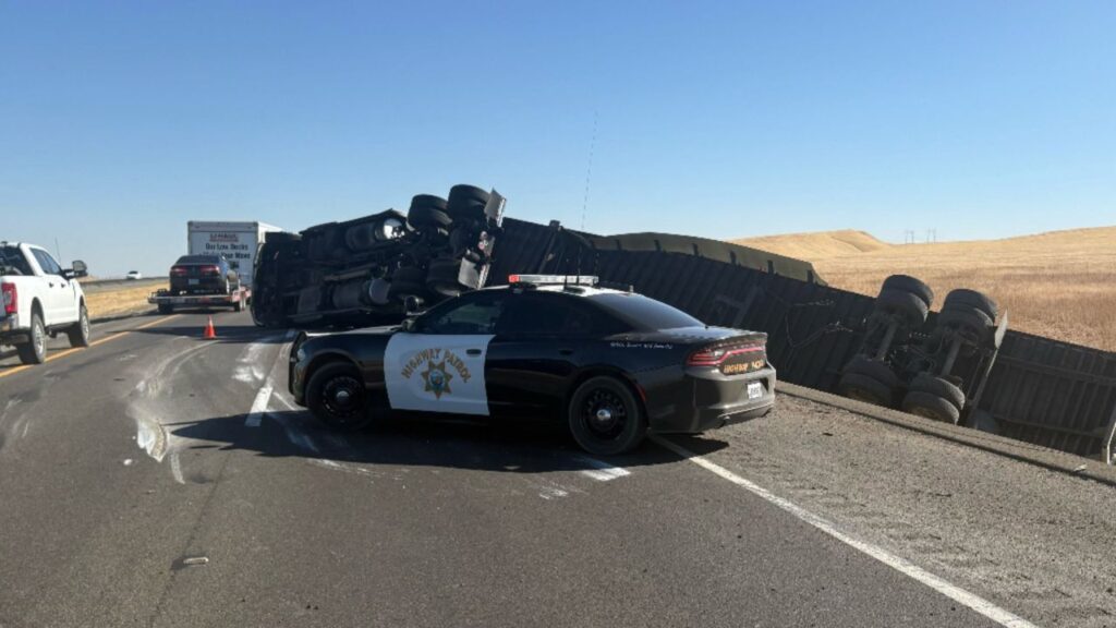 An overturned semi-truck has closed a lane on southbound Interstate 5 north of Tuolumne Avenue, prompting warnings of traffic delays. (CHP)