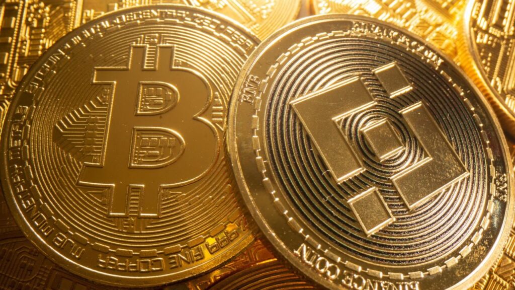 FILE PHOTO: A representations of cryptocurrency Bitcoin and Binance is seen in this illustration taken August 6, 2021. Reuters/Dado Ruvic/Illustration/File photo