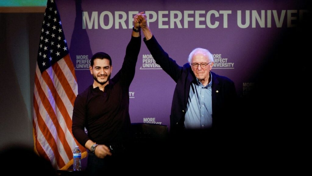 Democratic US Senate nominee Abdul El-Sayed and US Senator Bernie Sanders (I-VT) join hands at a More Perfect University presents Students vs Billionaires Town Hall in Ann Arbor, Michigan, US, October 26, 2026. REUTERS/Rebecca Cook