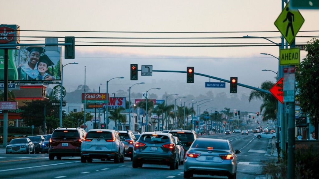 FILE — Evening traffic on Pacific Coast Highway in Los Angeles, June 28, 2024. Led by California, nearly two dozen states sued the Trump administration on Friday, Oct. 2, 2026, over its rollback of fuel-efficiency standards for cars, arguing that the move was based on a faulty analysis and violates federal law. (Stella Kalinina/The New York Times)