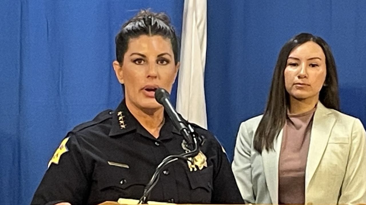 Fresno police arrested a 16-year-old Fowler boy in connection with Sunday's Tower District shooting that injured two people, including an innocent bystander. Photo: Fresno Police Chief (left) speaks at a podium with Fresno City Councilmember Annalisa Perea. (GV Wire/Bryant-Jon Anteola)
