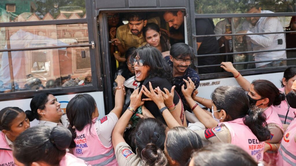 Protesters are detained by security personnel during a protest by the Cockroach Janta Party (CJP) seeking the resignation of India's Chief Election Commissioner Gyanesh Kumar, near the protest site in New Delhi, India, October 10, 2026. Reuters/Adnan Abidi