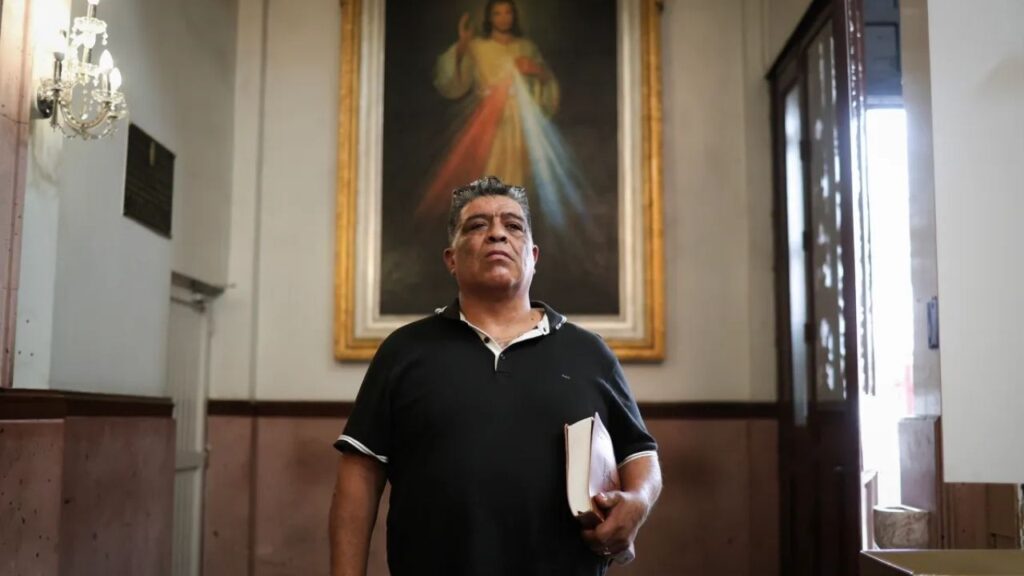 Luis Arreguin, 54, stands at the Cathedral of Mexicali, in Mexicali, Baja California, Mexico, on Oct. 21, 2026. Arreguin was arrested on Oct. 1 by U.S. federal immigration agents in Fresno while on his way to work and deported on Oct. 15. Photo by Daniel Resendiz for CalMatters
