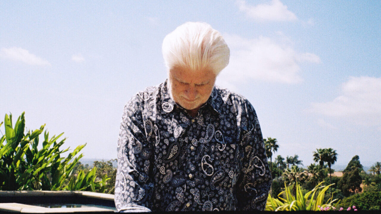 Image of pop star Michael McDonald looking down while outside at his Santa Barbara home