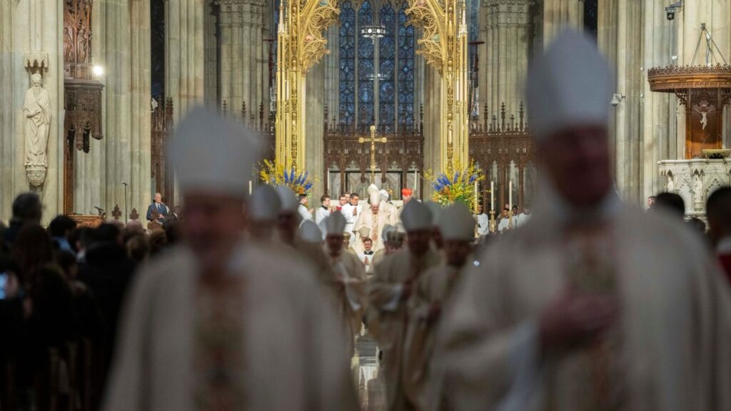 Mass of the Installation of Archbishop-designate Ronald A. Hicks at St. Patrick’s Cathedral in New York on Friday, Feb. 6, 2026. The Archdiocese of New York and plaintiffs’ lawyers were closing in on a settlement on Friday in which the church would pay more than $800 million to settle claims from 1,300 people who said they had been sexually abused by its clergy members and lay leaders. (Hiroko Masuike/the New York Times)