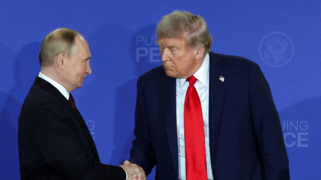 FILE PHOTO: U.S. President Donald Trump and Russian President Vladimir Putin shake hands during a press conference following their meeting to negotiate an end to the war in Ukraine, at Joint Base Elmendorf-Richardson in Anchorage, Alaska, U.S., August 15, 2025. Reuters/Jeenah Moon/File Photo