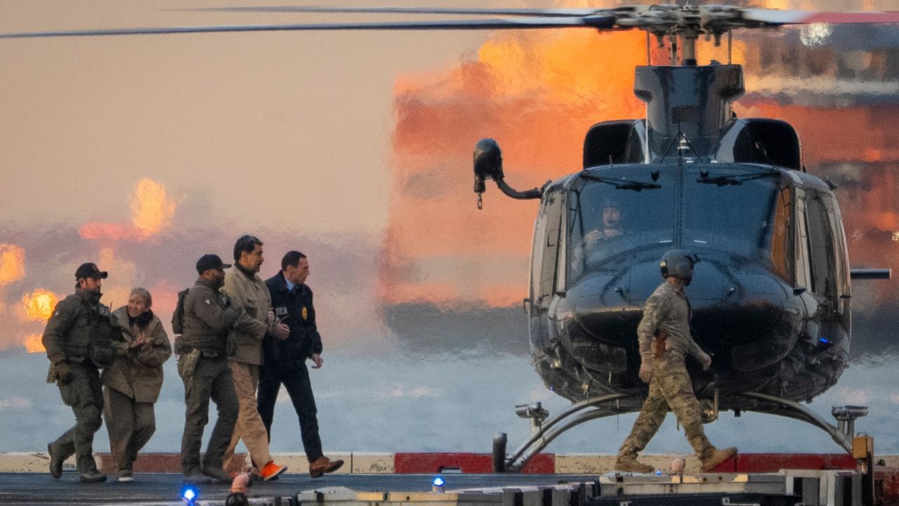 Nicolas Maduro, left, the ousted president of Venezuela, is escorted off a helicopter en route to the federal courthouse in Manhattan on Jan. 5, 2026. The Justice Department on Thursday announced new charges against the ousted Venezuelan leader Nicolás Maduro and his wife, Cilia Flores, accusing them of torturing American citizens and others held in Venezuela to repress opposition and preserve their power. (Vincent Alban/The New York Times)