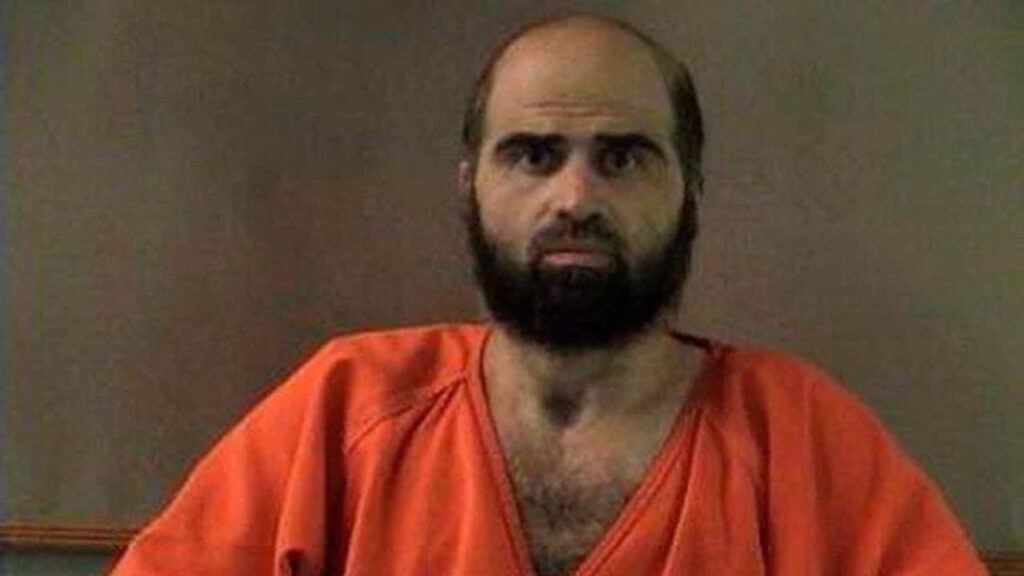 Nidal Hasan, charged with killing 13 people and wounding 31 in a November 2009 shooting spree at Fort Hood, is pictured in an undated handout photo obtained by Reuters on June 29, 2012. (Reuters File)
