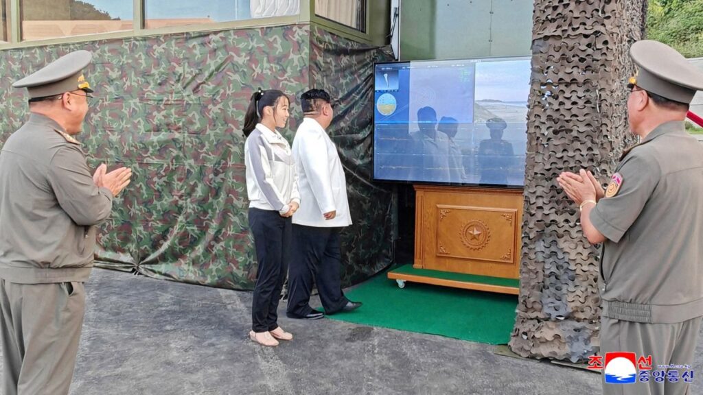 FILE PHOTO: North Korean leader Kim Jong Un, accompanied by his daughter Kim Ju Ae, attends a test of a new type of weapon at an undisclosed location, North Korea, September 20, 2026, in this picture released by North Korea's official Korean Central News Agency. KCNA via Reuters