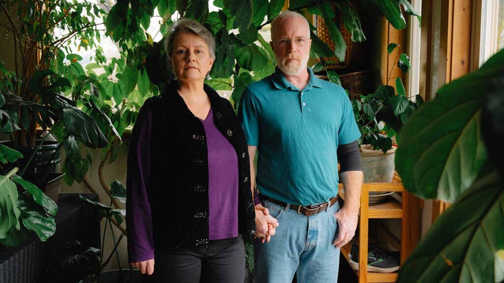 Kate Dwyer with her husband, Mark in Takilma, Ore., Dec. 19, 2025. They might drop their health insurance coverage next year, because it will cost $3,000 a month even at the cheapest available Obamacare plan. (Mason Trinca/The New York Times)