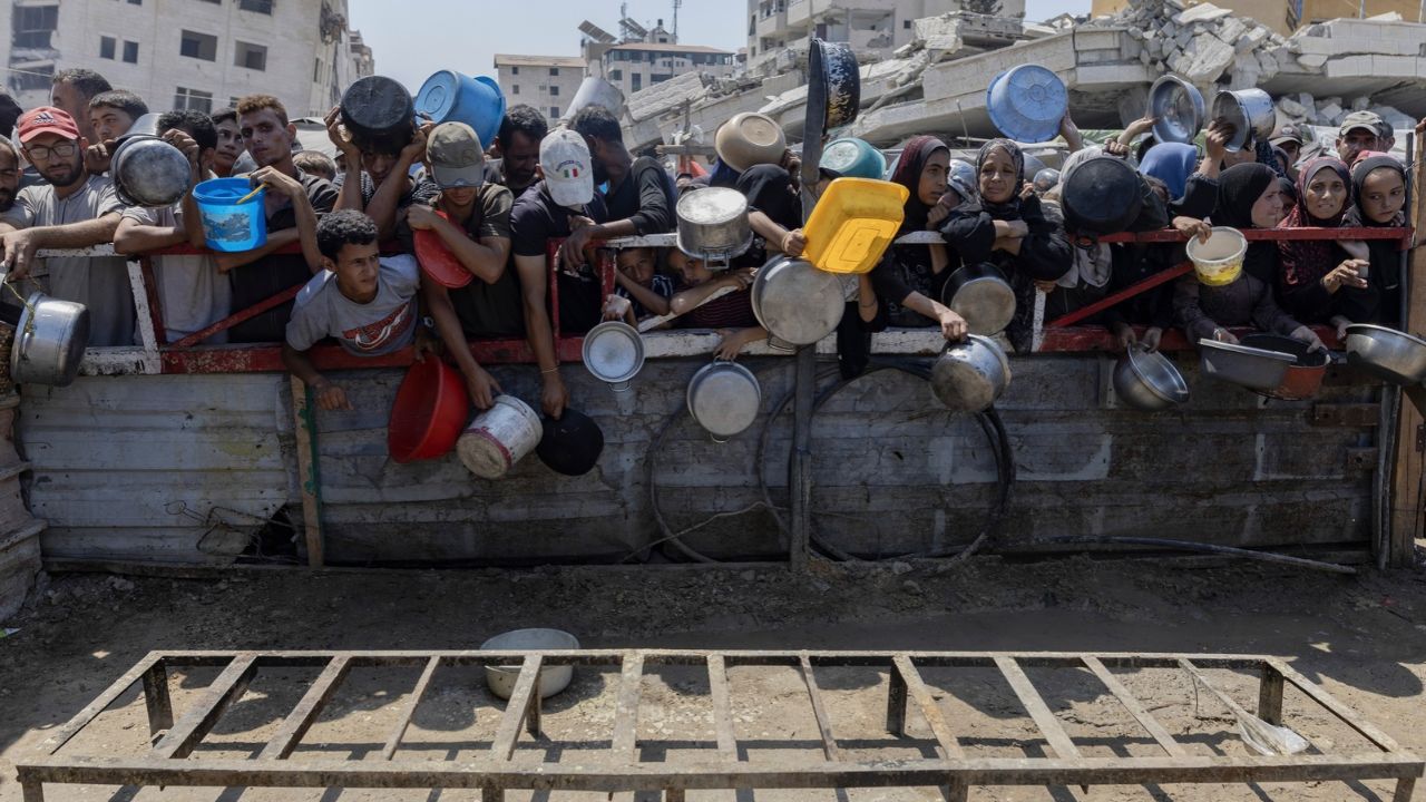 Palestinians wait for food distribution in Gaza City, July 23, 2025. Prime Minister Benjamin Netanyahu led Israel’s denunciations on Friday, Oct. 9, 2026, of the decision to award the Nobel Peace Prize to Navi Pillay, a human rights lawyer who was drawn into the international spotlight last year when a United Nations commission she chaired found that Israel was committing genocide against Palestinians in Gaza. (Saher Alghorra/The New York Times)