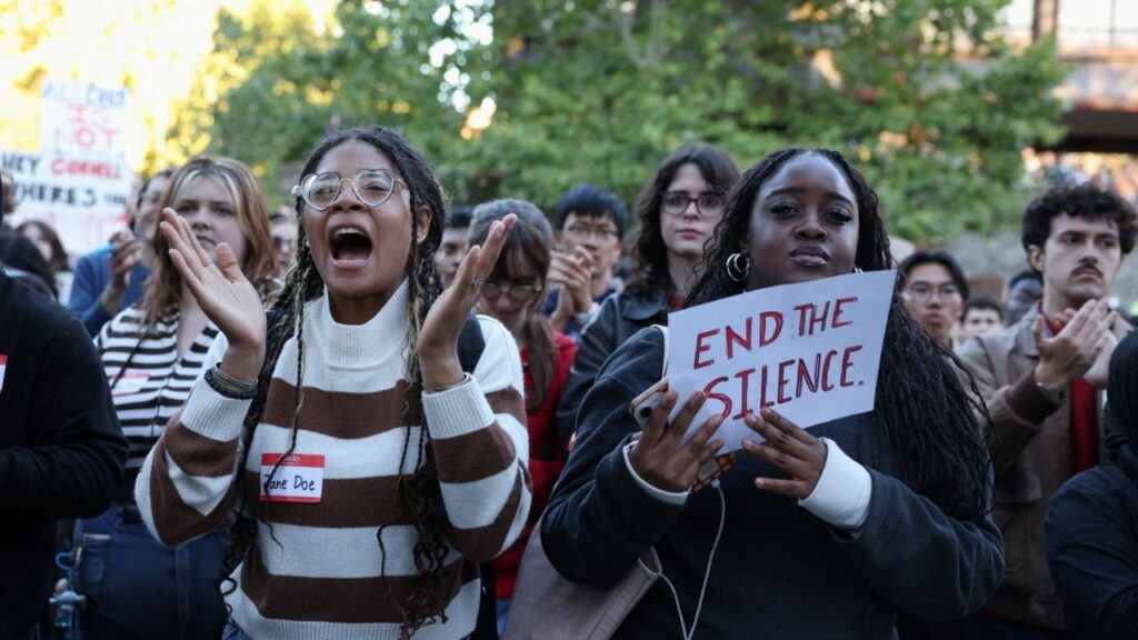 People attend a Justice for Survivors rally outside of the Day Hall administrative building at Cornell University in Ithaca, New York, US, October 5, 2026. REUTERS/Lauren Petracca