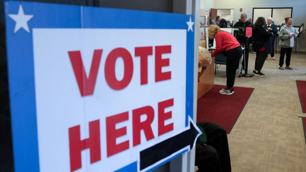 People cast ballots and register as early voting begins in Ohio, with former US Senator Sherrod Brown (D-OH) and Senator Jon Husted (R-OH) engaged in the second-most-expensive Senate race in the country, inside the Medina County Board of Elections in Medina, Ohio, US, October 6, 2026. (Reuters File)