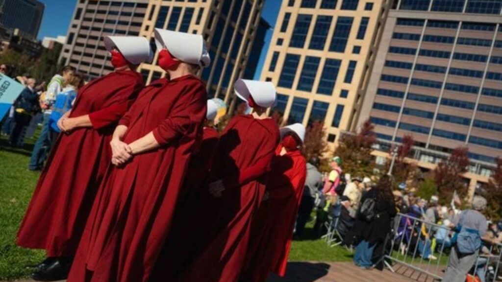 People gather during a No Kings rally at the Commons in downtown Minneapolis on Saturday, Oct. 17, 2026, ahead of the upcoming midterm elections. (Ben Brewer/The New York Times)