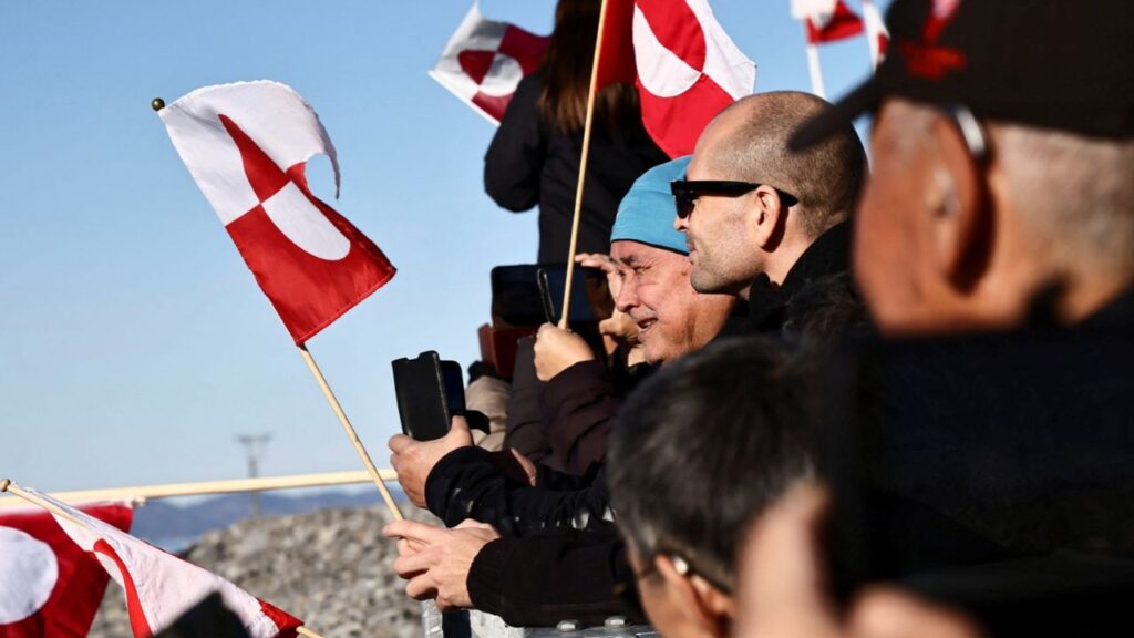 People wait for the arrival of the Greenlandic delegation after they agreed on a security deal with the US and Denmark at Nuuk Airport in Nuuk, Greenland, September 23, 2026. REUTERS/Tim Barsoe