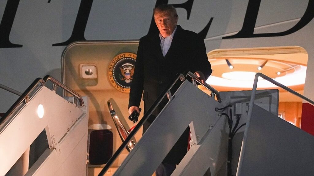 President Donald Trump disembarks Air Force One at Joint Base Andrews, Md., on Sunday, Oct. 25, 2026, en route to Washington after attending a midterm campaign rally in Michigan. (Haiyun Jiang/The New York Times)