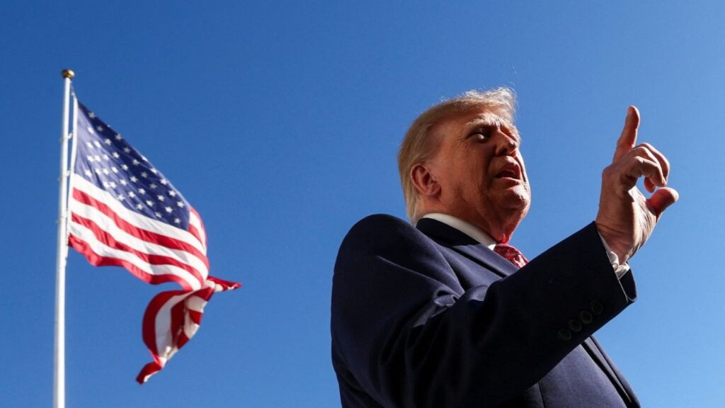 President Donald Trump speaks to members of the media as he departs the White House en route to Kansas, in Washington, DC, US, October 19, 2026. REUTERS/Kevin Lamarque