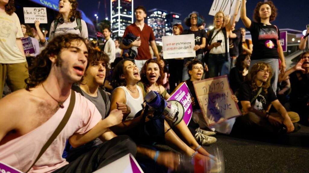 Protesters sit on a road as they take part in a rally demanding that Israel-Arab parties in Israel be included in the formation of the next government coalition after yesterday's general election, in Tel Aviv, Israel October 28, 2026 REUTERS/ Jamal Awad